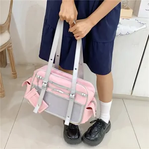 Kawaii pink Japanese JK style school bag featuring silver straps and mesh pocket detail