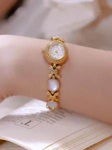 Elegante reloj de pulsera Bee Sister dorado con incrustaciones de nácar blanco natural