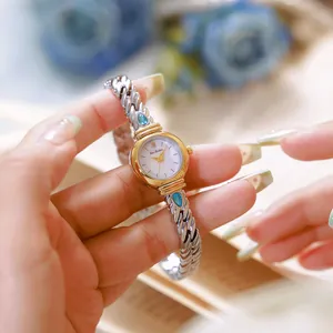 Elegante reloj de lujo Bee Sister con cadena de oro y plata y detalle de circón azul