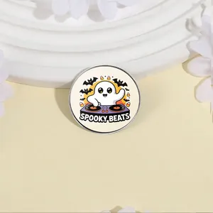 Close-up of a Halloween metal pin featuring a cute DJ ghost with Spooky Beats text