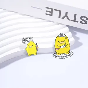 Close-up of funny medical-themed yellow duck enamel pins with humorous text