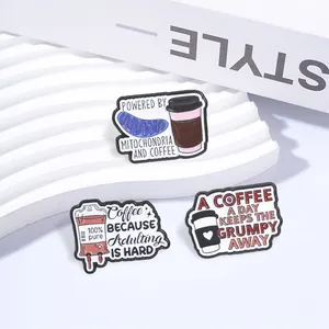 Detailed close-up of three fun coffee-themed metal enamel pins with humorous English quotes