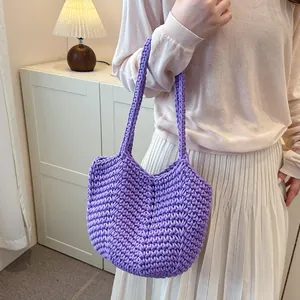 Vibrant purple crochet shoulder bag hand-knitted with high texture for stylish women