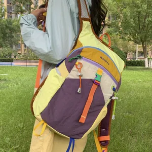 Detailed view of a colorful dopamine-style hiking backpack with Kazevo branding