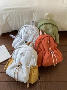 Juego de mini mochilas minimalistas y elegantes en varios colores para el uso diario