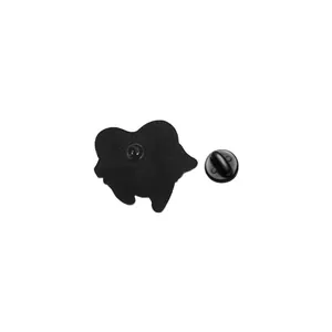 Detailed macro view of the back side of a tooth enamel pin with black rubber clutch accessory
