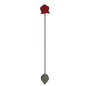 Macro detail of handmade red felt rose bookmark featuring green leaf and stem design