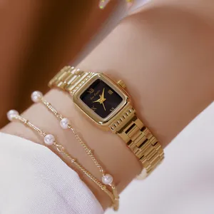 Elegante reloj de mujer en acero inoxidable dorado con esfera cuadrada negra y números