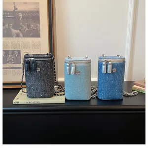 Trio of chic tweed texture chain phone bags in black and light denim blue colors