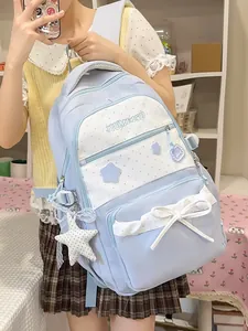 Cute light blue school backpack with star print and bow decoration for girls