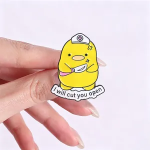 Funny nurse duck enamel pin with 'I will cut you open' text for backpack decoration.