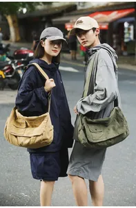 Durable unisex canvas messenger bag, large capacity leisure shoulder bag in earth tones