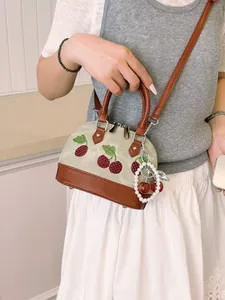 Bolso de mano tipo cúpula bordado con cerezas 2026 con amuleto de perlas para mujer
