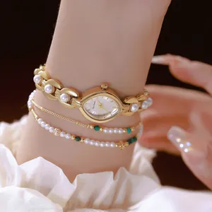 Elegante orologio Bee Sister FA1866 da donna in oro con cinturino di perle e design vintage