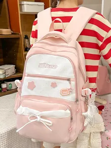 Cute pink and white Korean style school backpack with star print and bow detail