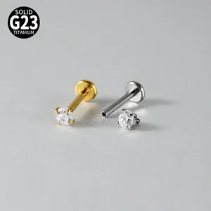 Macro view of G23 titanium internally threaded labret studs with cubic zirconia
