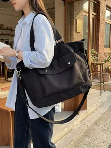 Large capacity black canvas travel tote bag for fashion casual daily shoulder use