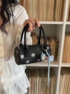 Fashionable black barrel handbag with cartoon prints for women's daily commute