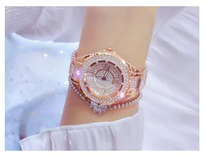 Detailed close-up of rose gold women's watch with full rhinestone encrusting on wrist