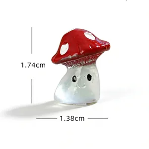 Detailed view of a miniature red resin mushroom figurine for micro-landscape decor