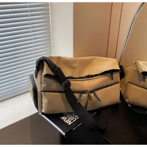 Trendy khaki multi-pocket sports messenger bag with wide shoulder strap