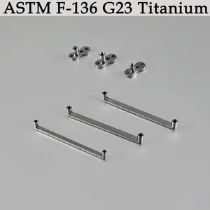 Detailed view of ASTM F-136 G23 titanium dermal anchor bases and flat bar attachments