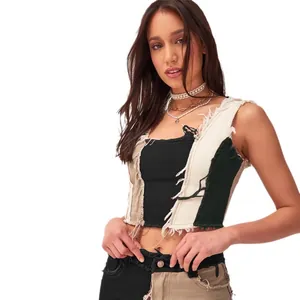 Women's multi-color patchwork denim cropped tank top with raw frayed edges on white background