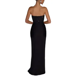 Elegant black strapless maxi dress with sequin bodice and slim fit silhouette for evening.
