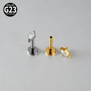 Detailed view of G23 titanium labret stud showing marquise zircon and internal thread