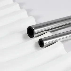 Macro view of high-quality stainless steel piercing sleeves on a white corrugated display