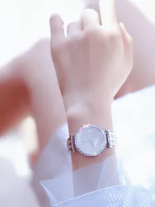 Close-up of silver BS Bee Sister women's watch with full crystal pavé dial and bezel