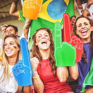Enthusiastic fans holding colorful giant foam fingers at a sports event cheering scenario.