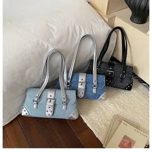 Retro denim baguette underarm bags with rivet details in light blue, dark blue and black
