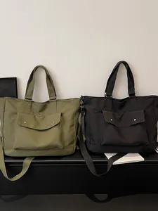 Large capacity travel tote bags in olive green and black, versatile casual shoulder bags