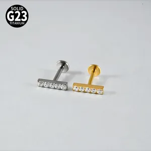 Solid G23 titanium labret studs featuring five sparkling CZ stones in a T-shape bar design