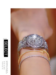 Detailed close-up view of luxurious silver women's watch with full diamond iced-out design