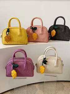 Stylish suede-textured Boston bags for women in five vibrant spring-summer colors