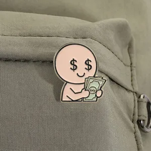 Detailed close-up of a funny cartoon metal brooch showing a figure holding money