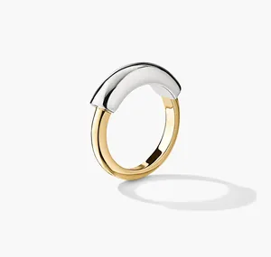 Detailed view of a modern two-tone silver and gold plated minimalist ring