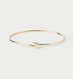 Bracelet jonc minimaliste élégant en argent 925 plaqué or avec un seul oxyde de zirconium