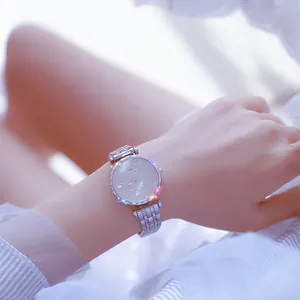 Elegant silver women's watch with rhinestone encrusted dial and metal link bracelet
