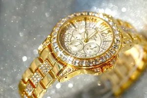 Detailed view of the gold luxury women's watch FA1158 with sparkling full rhinestones.