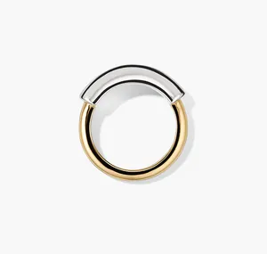 Close-up view of a minimalist two-tone sterling silver ring with a polished finish.