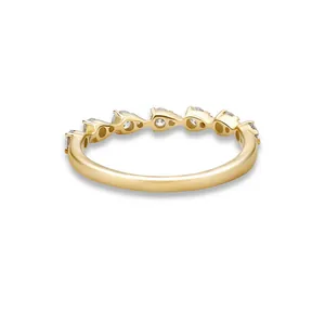 Detailed side view of a gold-plated S925 sterling silver ring with sparkling CZ stones