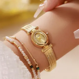 Reloj de lujo dorado para mujer con correa de espiga y diseño vintage elegante