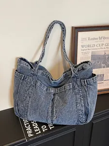 Grand sac fourre-tout en denim bleu délavé vintage avec poches fonctionnelles multiples