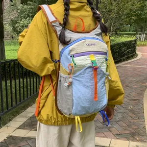 Vibrant multi-colored outdoor backpack with large capacity and dopamine style design.