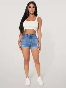 Pantalones cortos vaqueros de tiro alto con detalles desgastados y bajo doblado