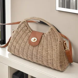 Retro hand-woven paper rope dumpling bag with brown leather strap and gold twist lock