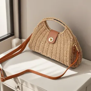 Elegant French style paper rope woven dumpling bag with adjustable brown strap